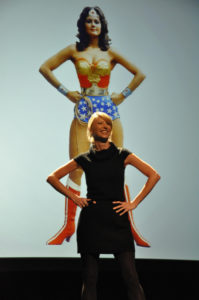 Social Psychologist Dr. Amy Cuddy demonstrating a power pose.